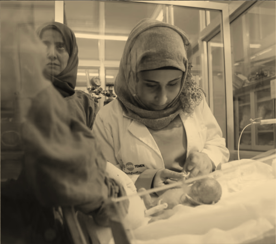 Midwife caring for a newborn